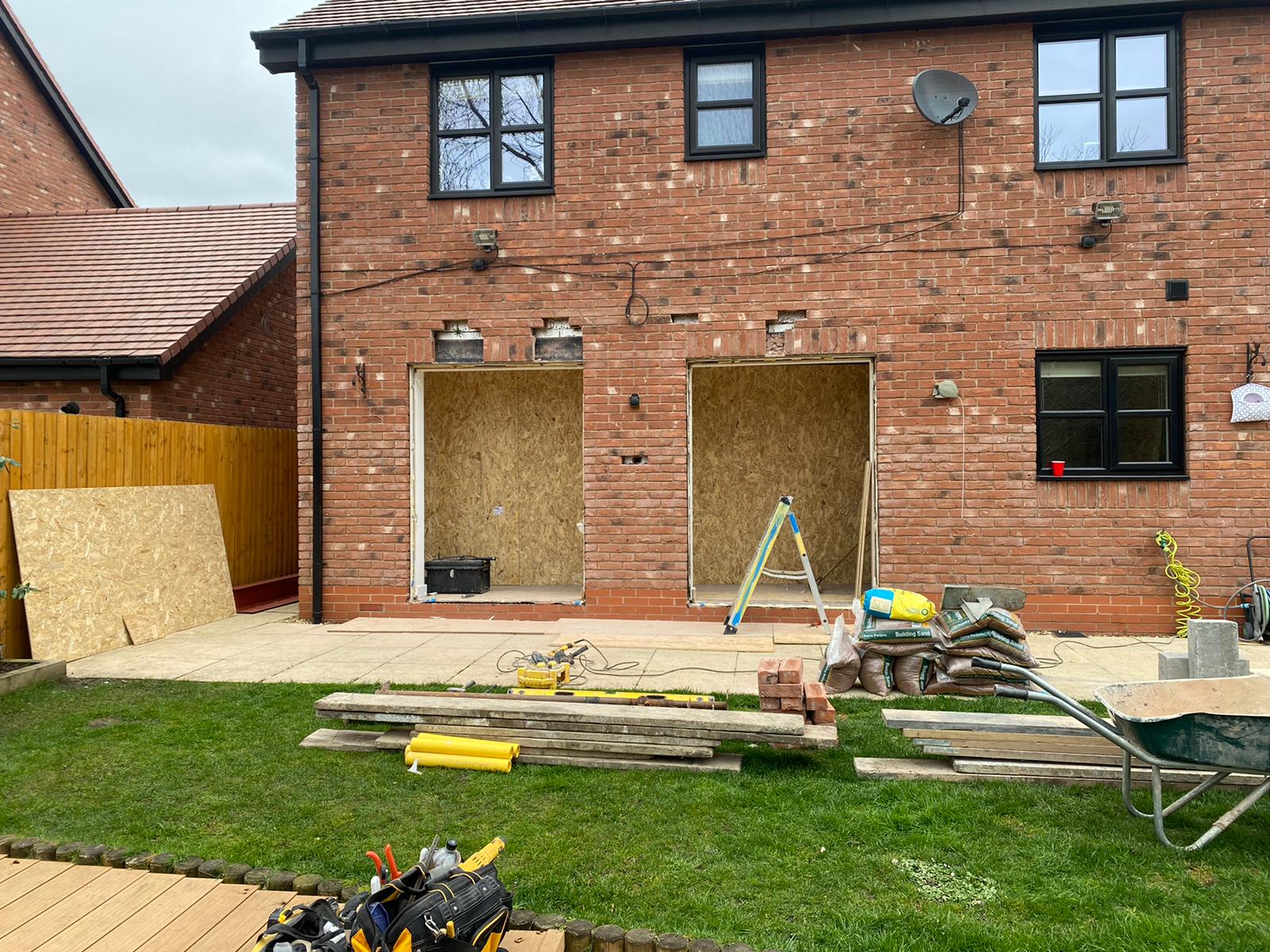 House with new openings formed in the brickwork during building work