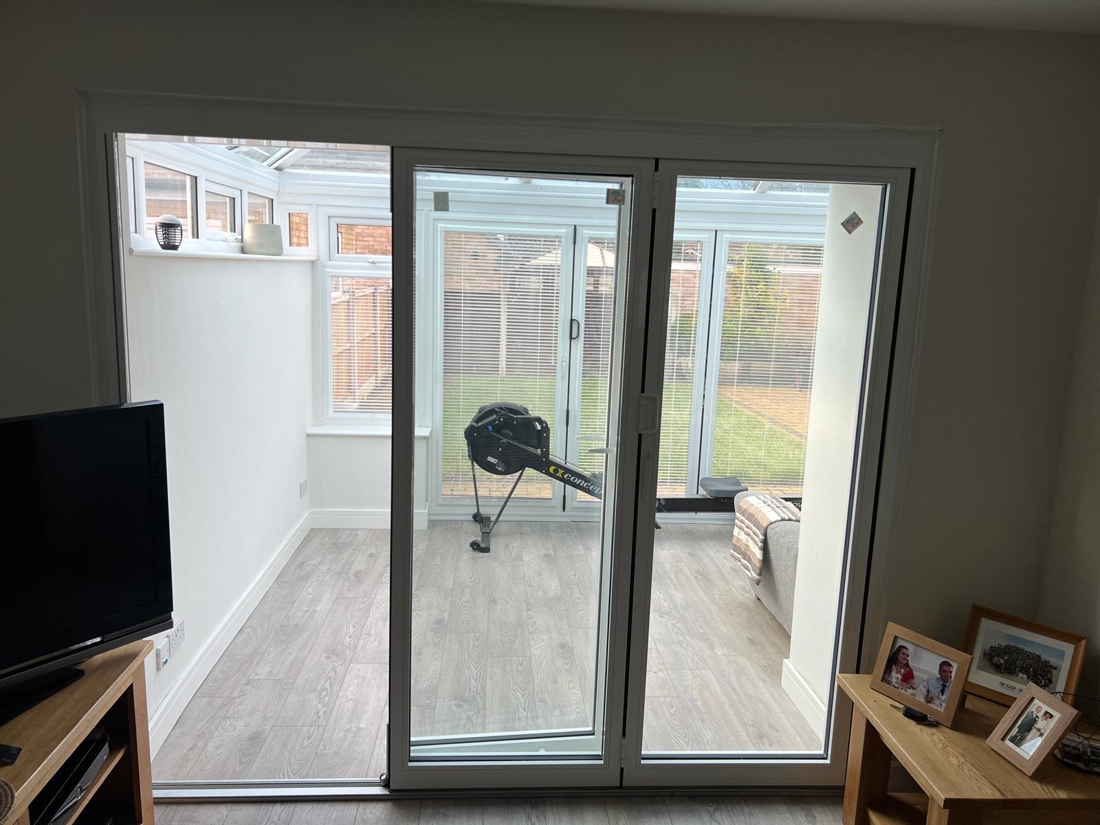 White framed glazed doors fitted to a home